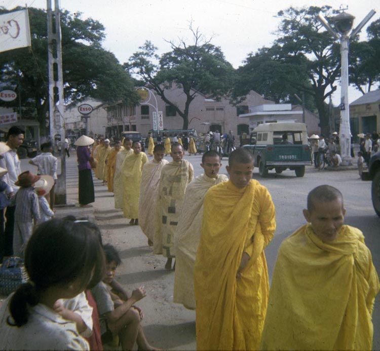58. Phan Rang: Buddhist Monks downtown to receive alms and food.[Generally, held anti-war sentiments. I wonder how they enjoyed their reeducation camps?]